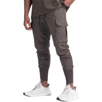 China European and American Anti-wrinkle Fashion Multi Pocket Zipper Casual Brand Woven Men's Trousers Slim Fit Gaiters Men's Pants for sale