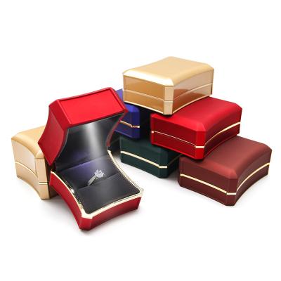 China Jewelry Packaging Luxury Wedding Jewelry Package Box With Led Lights Leather Jewelry Ring Necklace Packaging Boxes Set for sale