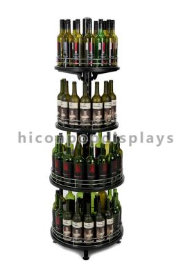 China Forma redonda da torre ajustável da exposição do vinho do retalho do dispositivo bonde 4-Layer da exposição da loja de vinho à venda