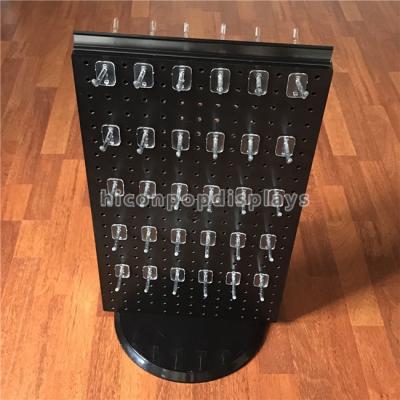 中国 取り外し可能なホックが付いている黒い紡績工の陳列だなの両方向のPegboardのテーブルの上の表示 販売のため