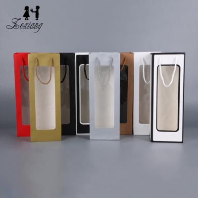 China Recycled Logo Portable Single Bottle Red Cheap Paper Bag Custom Window Paper Bag Wine Packaging Materials Gift for sale