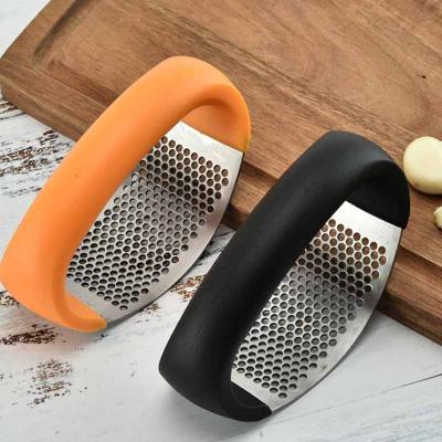 China Sustainable Manual Kitchen Stainless Steel Garlic Press Instruments Ginger Handheld Meat Grinder for sale