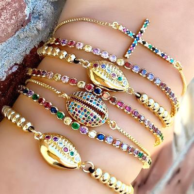 China FASHIONABLE Hot Sale 18K Adjustable Gold Plated Rainbow Cross Tennis Cubic Zircon Bracelet Shell Copper Beads Multicolor CZ for sale