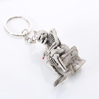 China Custom Unique Metal Toilet Smoke Rubber Fake Key Chain KC-078 for sale