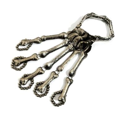 China Skeleton Hand Ring Bone Bracelet X2523 Halloween Skull Nightclub Finger Women Gothic Punk Bangles Bracelets for sale