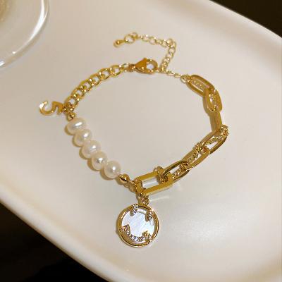 China TRENDY Korean fresh water pearl diamond-encrusted smiley face digital bracelet niche luxury elegant bracelet bracelet women for sale