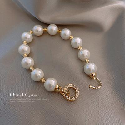 China TRENDY Korean genuine gold plated zircon fashion advanced sense personality temperament light luxury bracelet women's pearl bracelet for sale