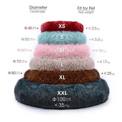 China New Luxury Super Soft Warm Plush Comfortable Pet Sleep Bed Around Calming Bed Cat House Sofa Cushion Bed Donut Washable Fluffy Dog for sale