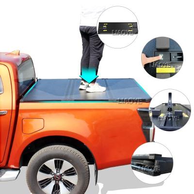 China Hard Aluminum Triple Pickup Tonneau Cover For Hilux 2016-2018 Revo Pick Up Truck Bed for sale