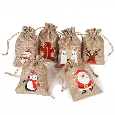 China Gift Bag 25pcs/bag Gift Bag Drawstring Santa Christmas Gift Packaging Bags for sale