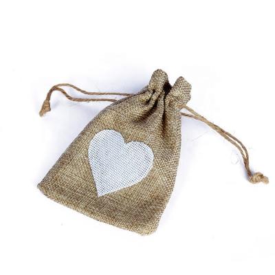 China Drawstring Storage Bag Heart Printing Burlap Hessian Bags with Drawstring Vintage Party Candy Gift Hessian Pouch for sale