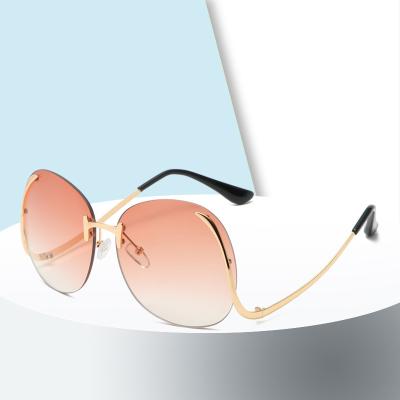 China Custom Anti UV400 Rimless Frames Logo Luxury Designer Woman Oversized Big Shading Sun Glass Sunglasses for sale