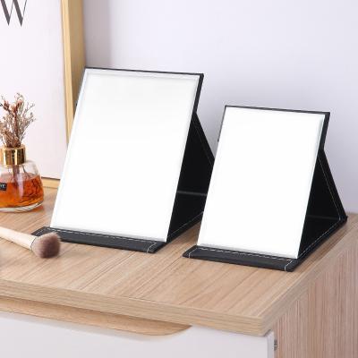 China New Unspecific Folding Makeup Mirror PU Leather Folding Rectangle Table Compact Portable Desktop Mirror for sale