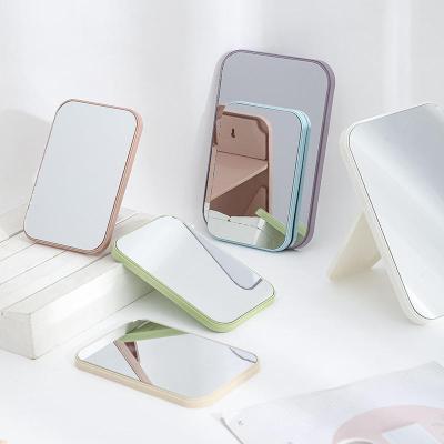 China Custom Wholesale Beauty Tools Plastic Makeup Mirror Beauty Frame Desktop Mirror With Folding Bracket for sale