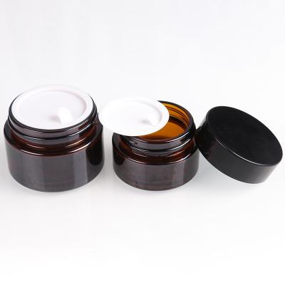 China Personal Care Customzed Cosmetic Jar Black Amber Brown Glass Lid for sale