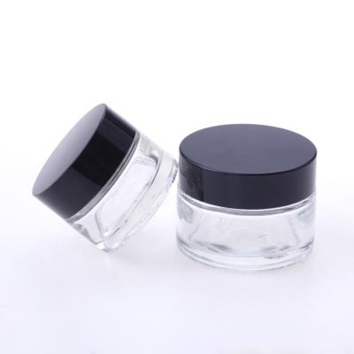 China Personal Care 5g 10g 15g 20g 30g 50g 60g 100g Empty Glass Jar With Black Lid for sale