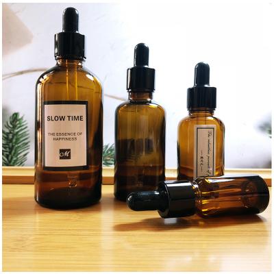 China Hot Sale 1oz 2oz Personal Care Amber Glass Dropper Bottle For Essential Oils for sale