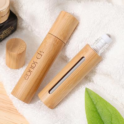 China New Design 10ml Personal Care Glass Roll On Bottle Bamboo Roll On Bottle For Essential Oil With Engrave Logo for sale