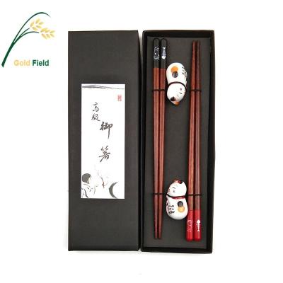 China 2021 Viable New Design Lucky Cat And Fish Design Wooden Tableware Chopsticks With Ceramic Chopstick Holders Gift Set for sale