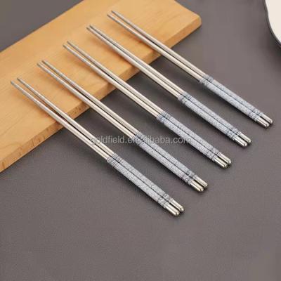 China Stainless Steel Blue and White Non-Slip Spiral Tableware Household Heat Insulation Porcelain Viable Adult Household Chopsticks for sale