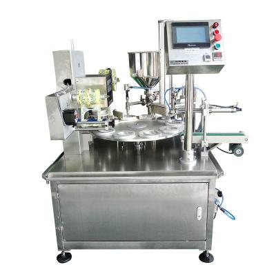 China Automatic Rotary Food Chocolates Rotary Ice Cream Cup Filling And Sealing Machine for sale