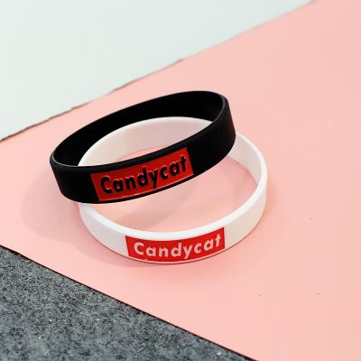 China FASHIONABLE Letters Simple Black And White Basketball Sports Silicone Bracelets Men And Women Energy Student Couples Rubber Bracelets for sale