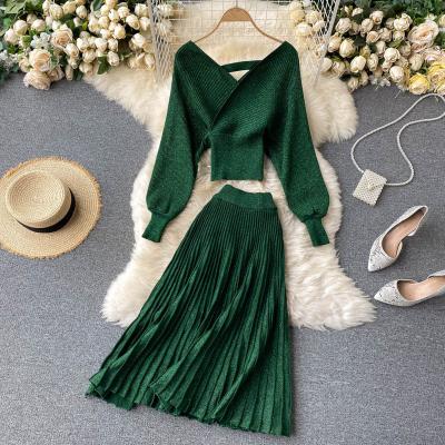 China Pleated knitted dress new top+Elastic high waisted sets puff sleeve skirt suit controlled by sexy crossvCollar short waist for sale