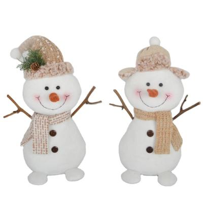 China 2021 New Christmas Fabric Plush Goods Wholesale Snowman Sitting Decoration Home Decor Fig 12 Inch for sale