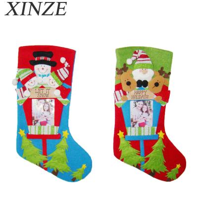 China Happy Gift Holiday Felt Christmas Gift Photo Frame Store Hanging Decorative Plush Snowman Socks Volume for sale