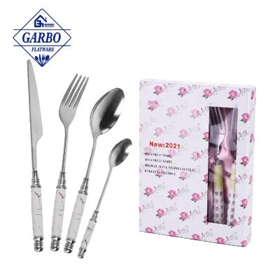 China Vintage Sustainable Royal Silverware Set 410 Stainless Steel Flatware Set With Handle 24 Pcs White Ceramic Food Grade Metal Flatware Set for sale