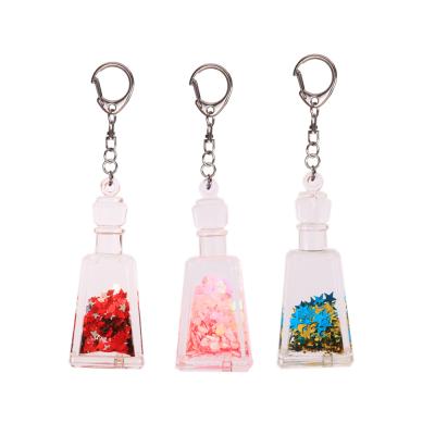 China Glitter Plastic Acrylic Oilfield Bubble Fashion Key Chain Promotion Gift Christmas Key Chain for sale