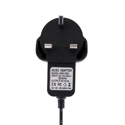 China High Quality UK Plug 5V 1A 2A Power Adapter 5V 3A 4A 12V 1A 2A Power Supply AC Adapter 5v 1a 2a Long Life High Efficiency And High Reliability 12V for sale