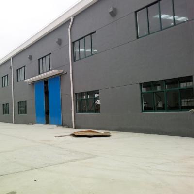 China Prefabricated Metal Construction Building Q355b Q235b Steel Frame Construction Buildings Te koop