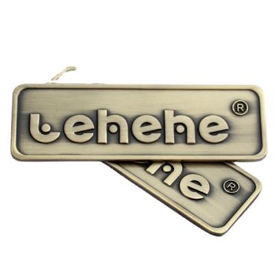 China Customized cheap nameplate waterproof metal emblem label newest car name plate logo metal high quality enamel badge for sale for sale