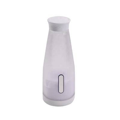 China Car Shakes and Personal Smoothies Juicer Cup Bottle with 4 Blades USB Rechargeable for Home Travel Outdoor Portable Mini Blender for sale