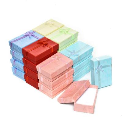 China Velvet Cardboard Gift Box Jewelry Box Velvet Packaging Hexagon With Ribbon for sale