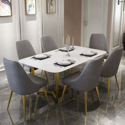 China Simple rectangular dining table and chair combination (the other) Nordic light luxury marble adjustable dining table hotel for sale