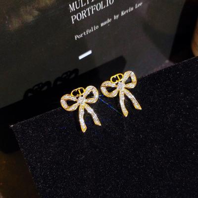 China FASHIONABLE Bowknot 18k Gold Beautiful Exquisite Hot Selling Jewelry KYED0791 Small Zircon Stud Earring For Women for sale