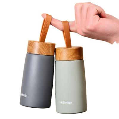 China 2023 New 260ml Double Lid Stainless Steel Wall Vacuum Sustainable Wood Thermal Stainless Steel Water Bottle Portable Student Water Bottle for sale