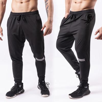 China Breathable custom logo workout sports quick dry clothing wholesales gym wear for men pant fitness clothing tracker for sale