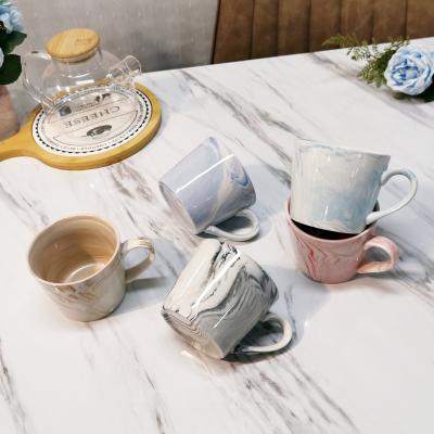 China WKTM010 Chaozhou Porcelain Factory Ceramic Mug Souvenir Stocked Volume With Spoon With Silicone Lid With Cover Marble Coffee Mug for sale