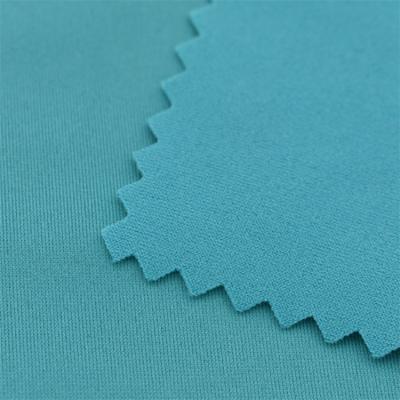 China Stretch Polyester Warp Knit Spandex Fabric Semi-gloss Two Way Knit Plain Dyied Fabrics for sale