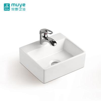 China Elegant Art Ceramic High Ceramic Sink Small Size Rectangular Design Bathroom Sink Hand Wash Hand Counter Basin for sale