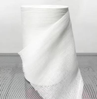 China 90cmx100cm High Absorbency Gauze Roll 100% Bleached Cotton With X Ray Detectable Thread Packed By Woven Bag for sale