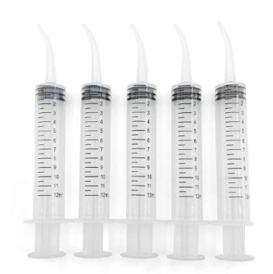 China Disposable Transparent Dental Irrigation Syringe With Curved Tip 12ml Dental Care Tools With CE ISO for sale