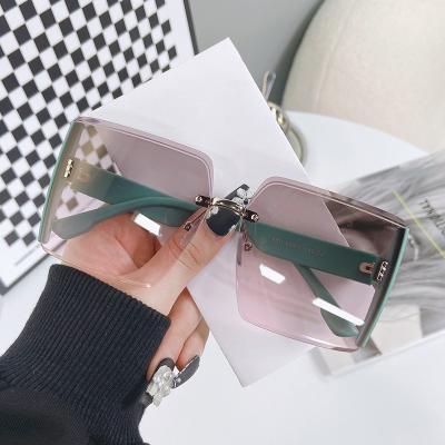 China Fashion sunglasses the new retro frameless mirror sunglasses big box shading UV protection for sale