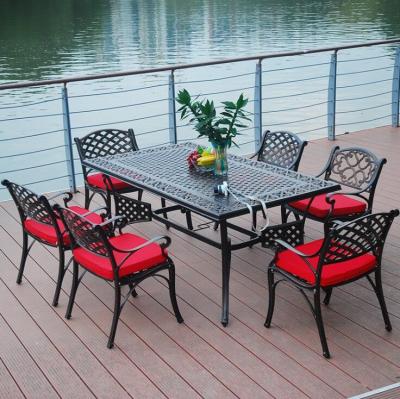 China Modern Outdoor Iron Garden Wrought Iron Table And Chairs Dining Table for sale