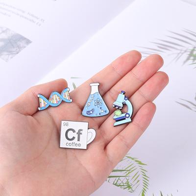 China Wholesale Creative Cf cup shape painting badge pin alloy cartoon table lamp designs school cartoon brooch chemical pin for sale