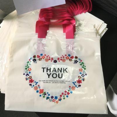 China Hot Sell Wholesale Recyclable Custom Made Logo Printed LDPE Plastic Handle Shopping Bag Recyclable For Clothing Package for sale