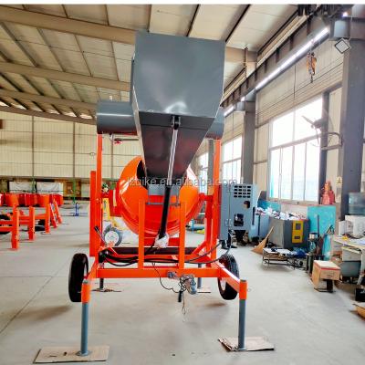 China Self loading Automatic Concrete Mixer hopper machine cement mortar drum Te koop